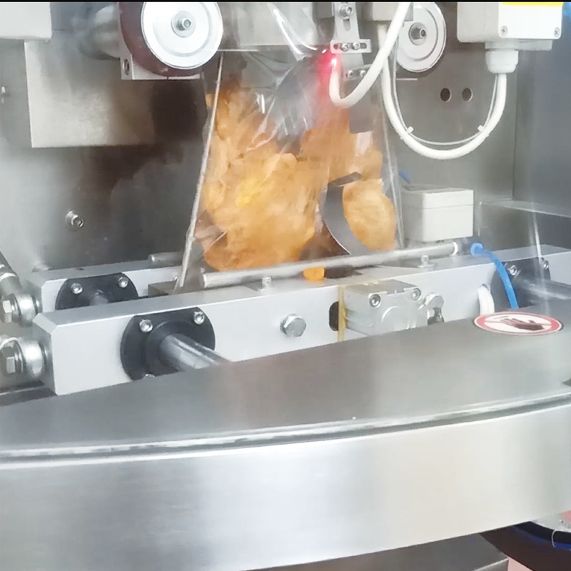 Technologie de pesée dynamique et pesée de précision Combinaison parfaite pour la machine d'emballage de nourriture surgelée