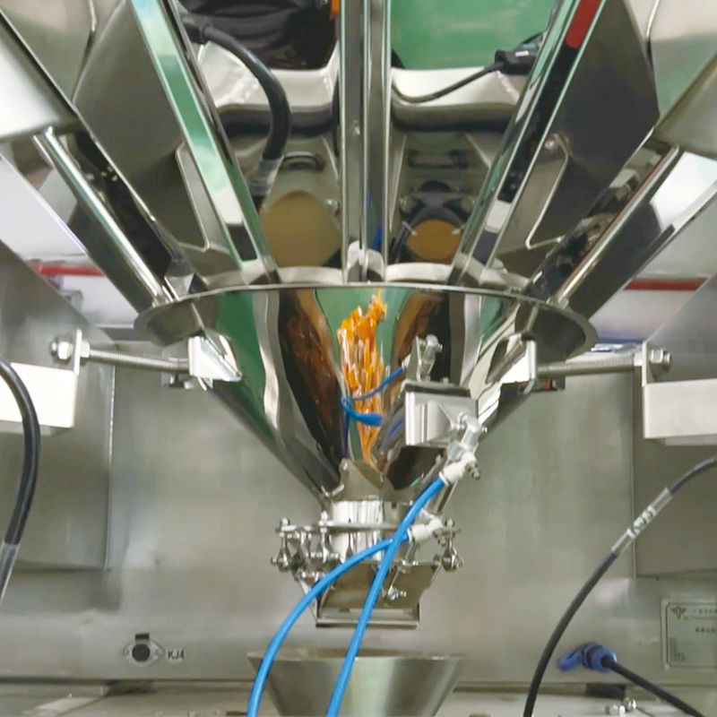 Machine verticale automatique quantitative de remplissage, de scellage et d'emballage VFFS pour aliments en granulés, avec pesage et emballage