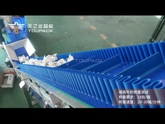 TOUPACK Système de pesage et de cartonnage du lait en sacs